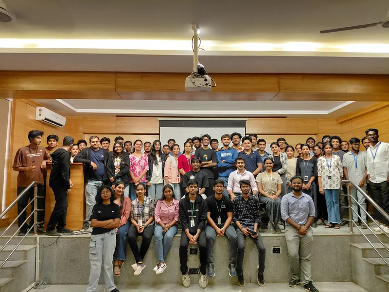 A big group photo on a staircase